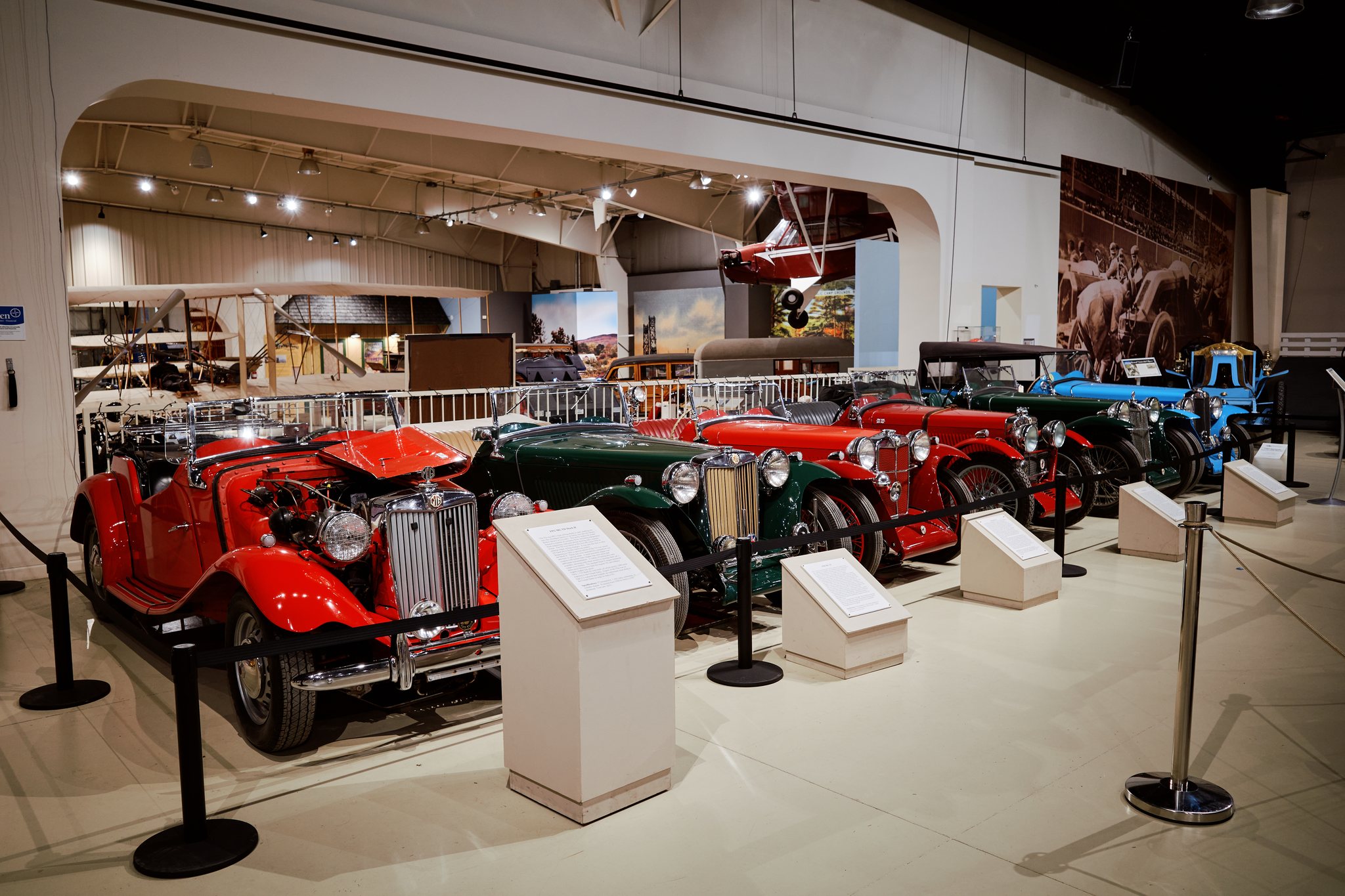 Ultra HDR version of the vintage-car gallery with brighter lamps, paint, and chrome highlights.